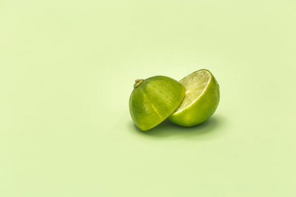 lime-cut-in-half-on-green-surface-2