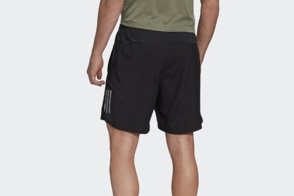Pantalon corto Own the Run Negro FS9807 23 hover model Copy 1